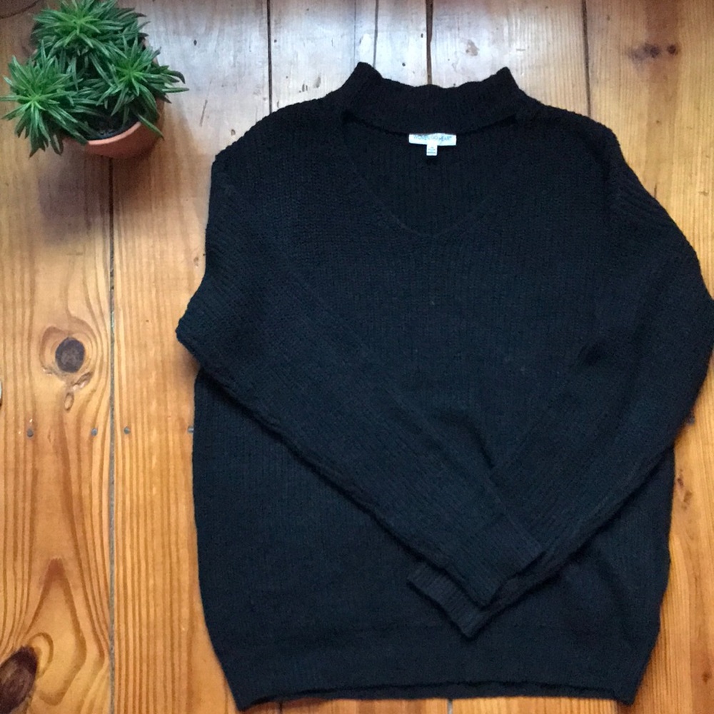 Black sweater with V neck cut out!